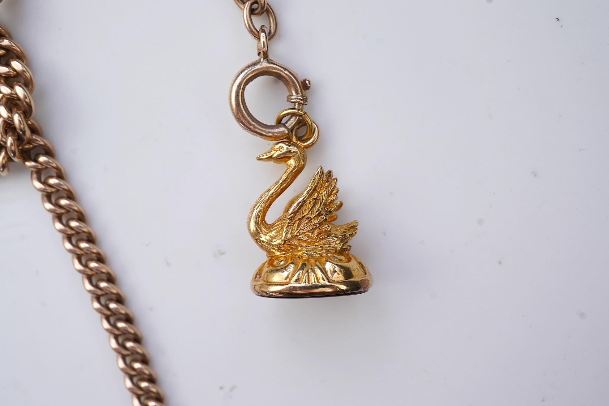 A gold Albert chain, sovereign coin pendant and fob seal, early 20th century